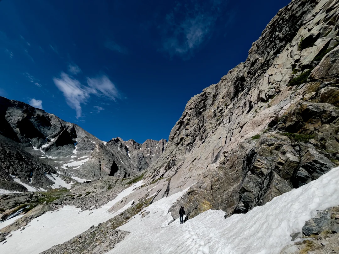 a man treking through the mountains of Longs Peak, Colorado, USA